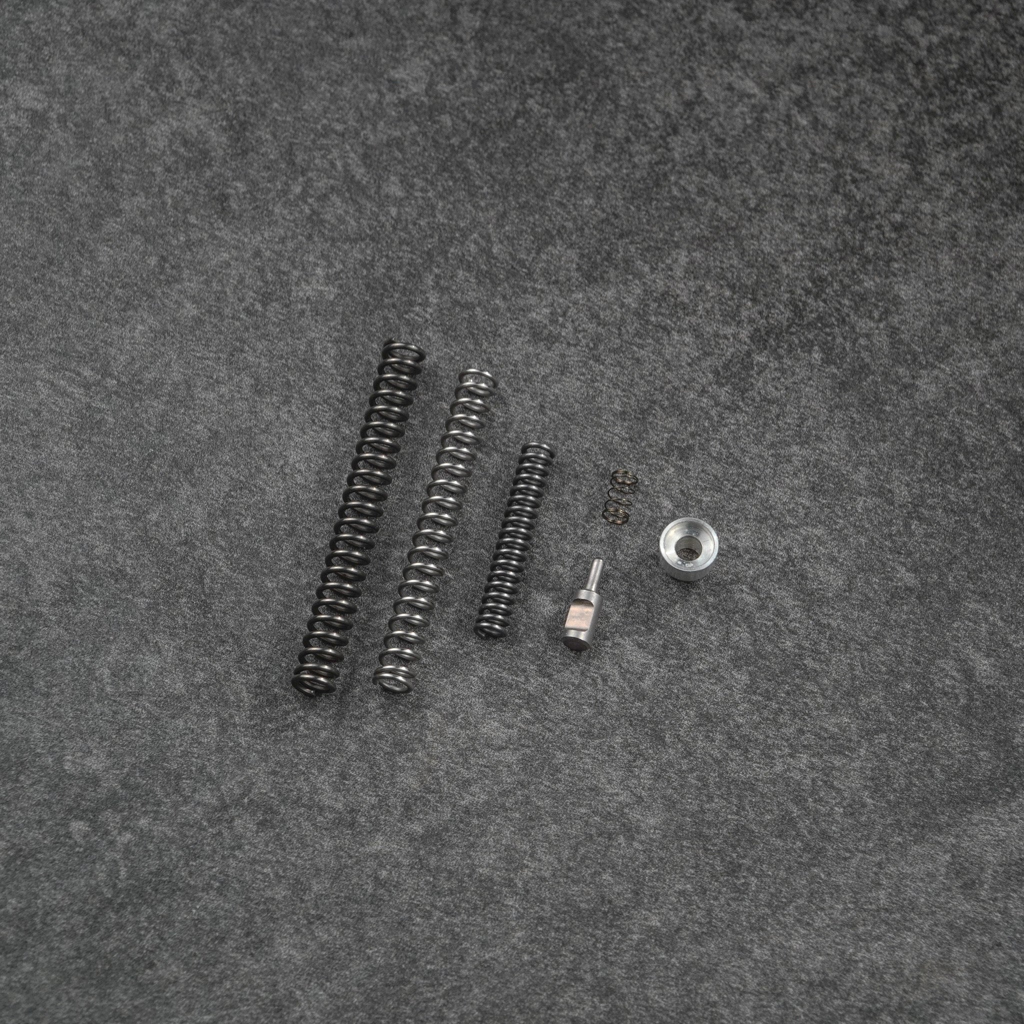 Upgrade Your Revolver Performance with TK Custom Spring Kits – TK ...